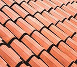 New curved orange roof tiles
