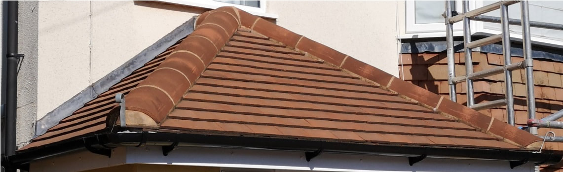 New pitched tile porch roof